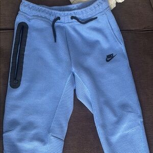 Nike Tech Blue Sweatpants with Tapered Fit and Ribbed Texture